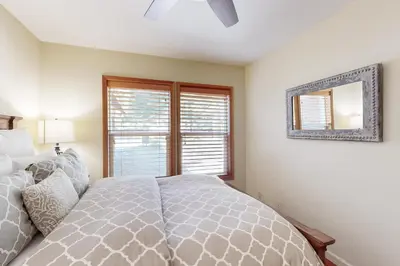 a bedroom with a bed and a window at Zermatt Getaway in Truckee