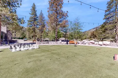 a game of chess on a lawn in a park at Resort at Squaw Creek's 810 & 812 in Olympic Valley