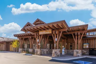a large wooden building with a sign in front of it at Pathway Paradise in Truckee