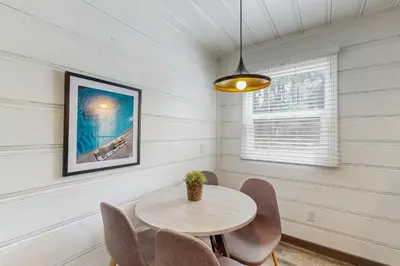 a dining room with a table and chairs at Manzanita Holiday 5 in South Lake Tahoe