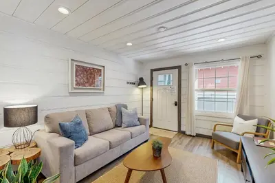 a living room with a couch and a table at Manzanita Holiday 5 in South Lake Tahoe