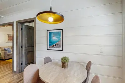 a dining room with a table and chairs at Manzanita Holiday 5 in South Lake Tahoe