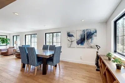 a dining room with a table and chairs at North Lake Adventure in Carnelian Bay