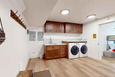 a laundry room with a washer and dryer in it at North Lake Adventure in Carnelian Bay