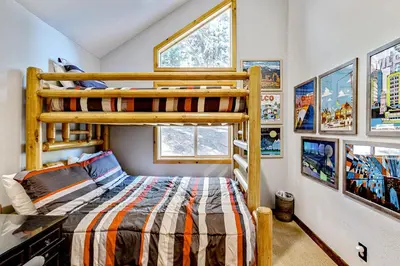 a bedroom with a bunk bed in a house at Lausanne Getaway in Truckee