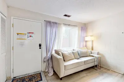 a living room with a couch and a window at Ski Run Village in South Lake Tahoe