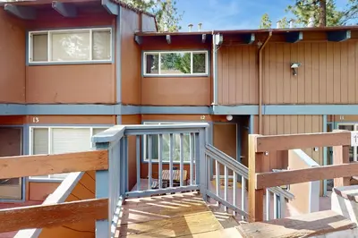 a building with a ramp leading up to a house at Ski Run Village in South Lake Tahoe