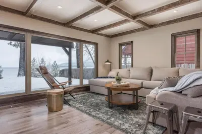 a living room with a couch and a table at Lakeview Manor in South Lake Tahoe