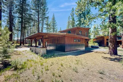 a house in the middle of a forest at Henness Escape in Truckee