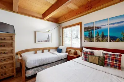 a bedroom with two beds and a window at Gold Bend Escape in Truckee