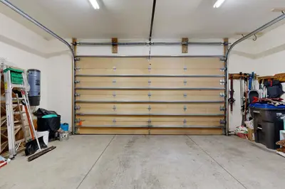 a garage with a pair of sliding doors at Oslo Manor in Truckee