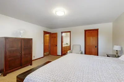 a bedroom with a large bed and a dresser at Amazing Dollar Point Retreat in Tahoe City
