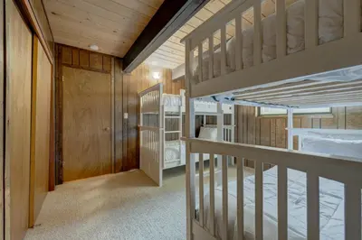 two bunk beds in a room with a hallway at Dollar Point in Tahoe City