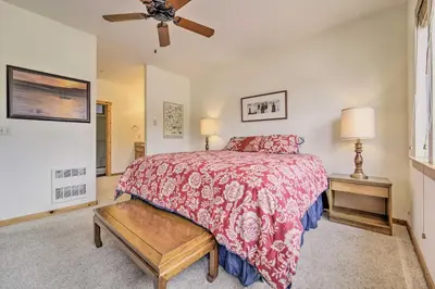 a bedroom with a bed and a ceiling fan at 2 Mi to Donner Lake Walkable Truckee Condo! in Truckee