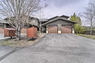 a house with a driveway with a garage at 2 Mi to Donner Lake Walkable Truckee Condo! in Truckee