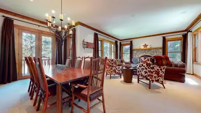 a dining room with a table and chairs at Lodestar #2001 home in Mammoth Lakes