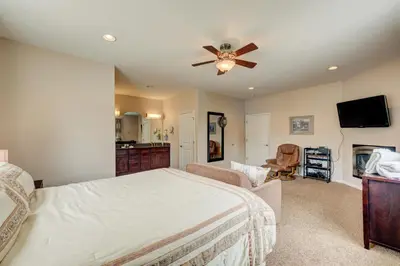 a bedroom with a bed and a ceiling fan at Mountain-View Eden in South Lake Tahoe
