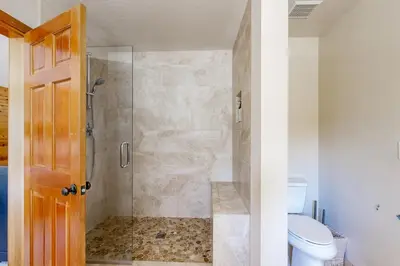 a bathroom with a shower and a toilet at Snowpeak Oasis in Truckee