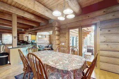 a dining room and kitchen with a table and chairs at Marshall Haven in South Lake Tahoe