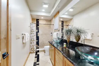 a bathroom with a sink and a toilet at High Meadows Gem in South Lake Tahoe