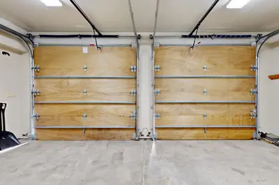 two sets of garage doors in a room at High Meadows Gem in South Lake Tahoe