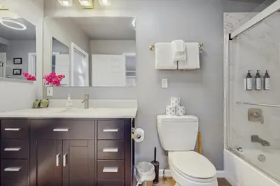 a bathroom with a toilet and a sink and a shower at Apache Adventures in South Lake Tahoe