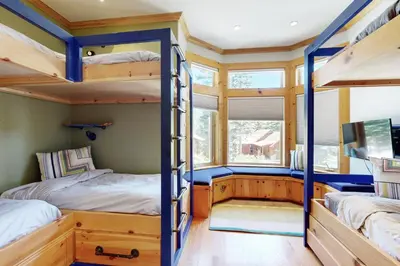 two bunk beds in a tiny house at Wooded Luxury at Tahoe Donner in Truckee