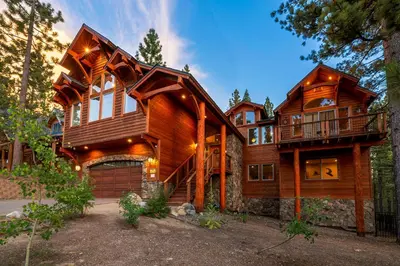 a large wooden house with a balcony at Marshall Escape in South Lake Tahoe
