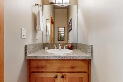 a bathroom with a sink and a mirror at Pine Haven in Kings Beach