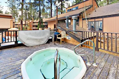 a bath tub sitting on top of a deck at The Summit E3 in South Lake Tahoe