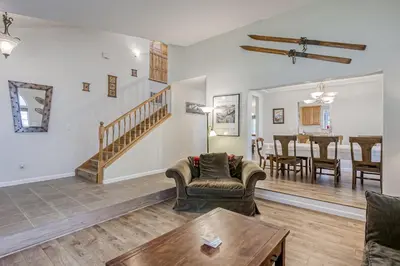 a living room with a couch and a table at Montgomery Estates Ski & Beach Haven in South Lake Tahoe