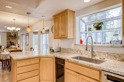 a kitchen with a sink and a window at Montgomery Estates Ski & Beach Haven in South Lake Tahoe