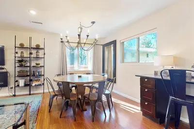 a dining room with a table and chairs at Cellador Charms in South Lake Tahoe