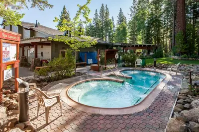 a swimming pool in the backyard of a house at Rocky Point Charms in Truckee