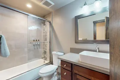a bathroom with a sink toilet and a shower at Arrowhead Adventures in South Lake Tahoe