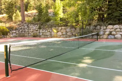 a tennis net on a tennis court at Resort at Squaw Creek's 556, 558, & 560 in Olympic Valley