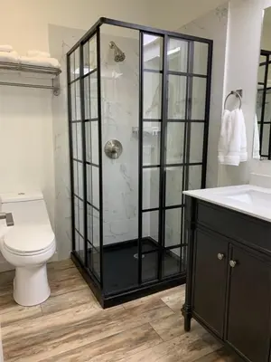 a bathroom with a shower and a toilet and a sink at Rr-edgewater04 in June Lake