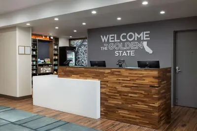 a welcome to the golden state counter in a store at Hampton Inn Oakhurst-Yosemite in Oakhurst