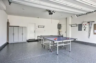 an empty room with a ping pong table in it at Relaxing Roseville Home with Outdoor Amenities in Roseville