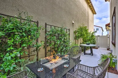 a patio with a table and chairs and a fence at Relaxing Roseville Home with Outdoor Amenities in Roseville