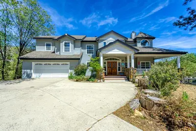 a house with a driveway in front of it at Cascadel Haven in North Fork