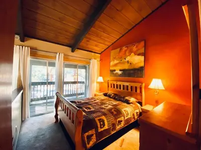a bedroom with a bed and a large window at Mammoth Awesome Location-1 min to Shuttles & Food! TOML-CPAN-11402 in Mammoth Lakes