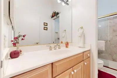 a bathroom with a sink and a mirror at All-Season Getaway in Kings Beach