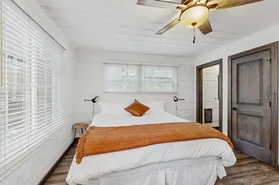 a bedroom with a bed and a ceiling fan at Manzanita Holiday 3 in South Lake Tahoe
