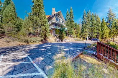 an empty road in front of a house at Huntington Lake Condo #102 in Lakeshore