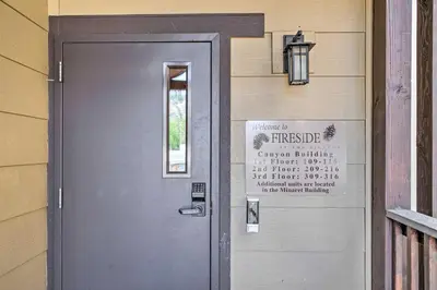 a door to a building with a sign on it at Luxe Mountain Home in Village, Steps to Gondola! in Mammoth Lakes