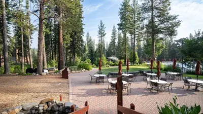 a group of tables and chairs in a park at Ski-InSki-Out Access to Northstar Resort Near Truckee Sierra by AvantStay in Kingswood Estates