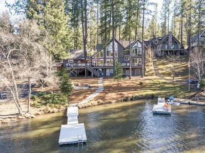 an aerial view of a large house on the water at Lakefront Casa Cassaretto in Groveland