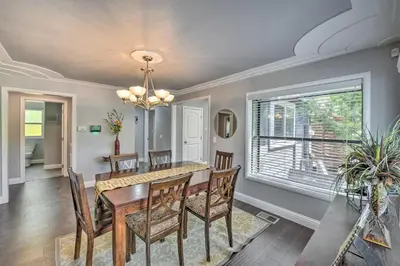 a dining room with a table and chairs and a window at Less Than 3 Mi to Dtwn Placerville Home with Outdoor Oasis in Placerville