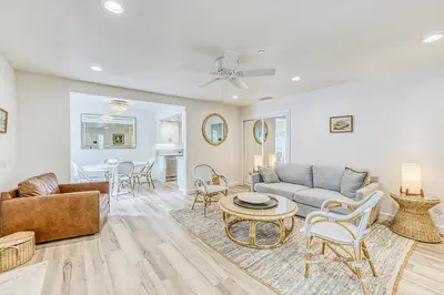 a living room with a couch and a table at Slide Creek Retreat in Bass Lake